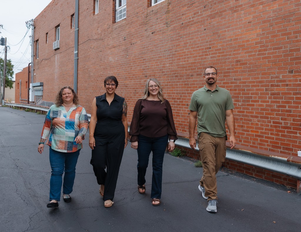 Forge Wellness Collective team walking in downtown Newton, Kansas